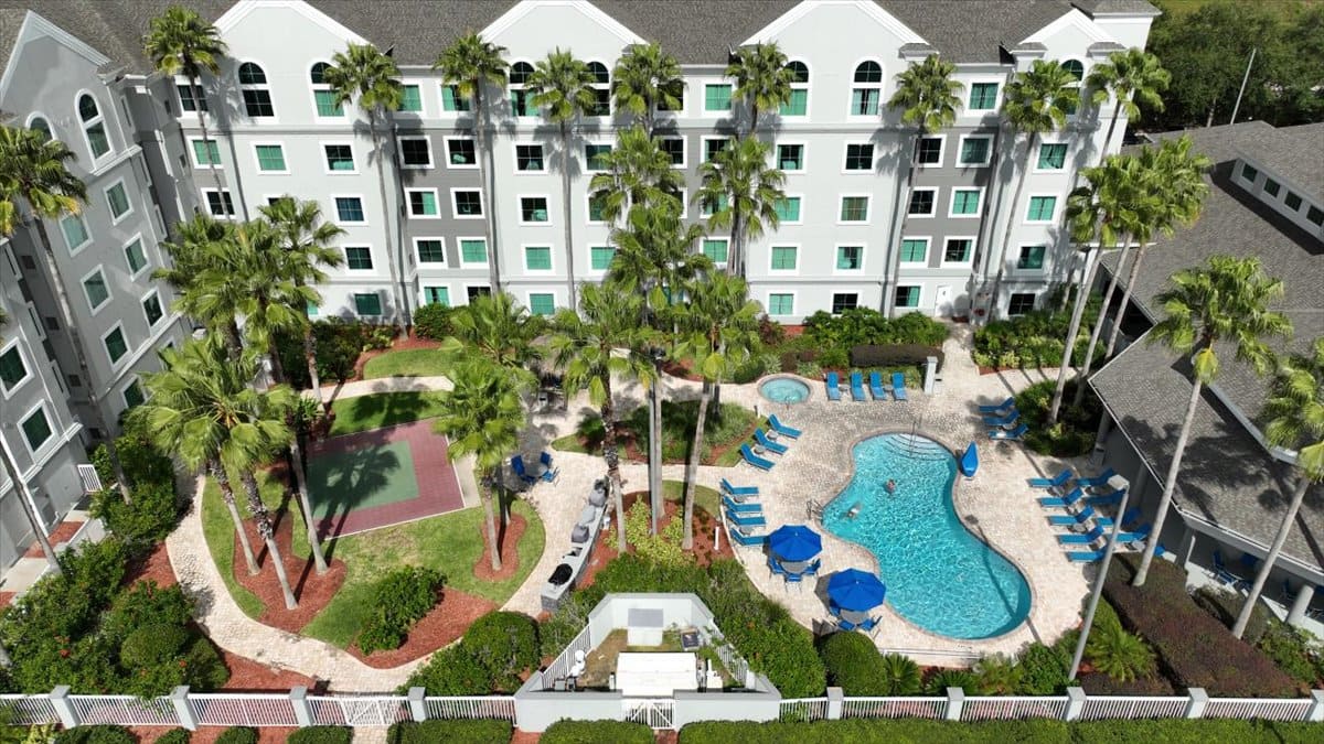 Aerial view of Hawthorn Suites Lake Buena Vista with pool, hot tub and basketball court