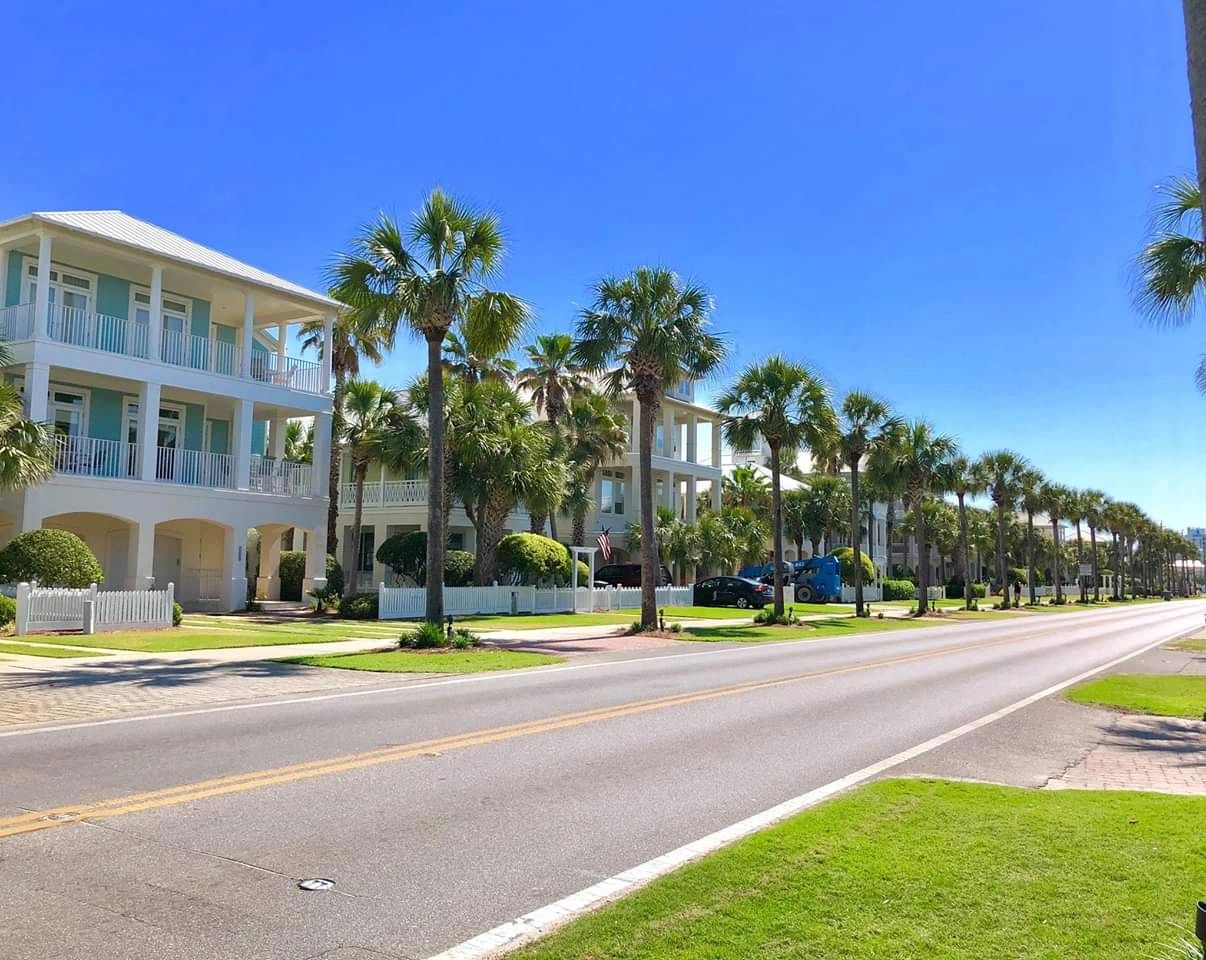 Palm-lined street on Florida’s Emerald Coast